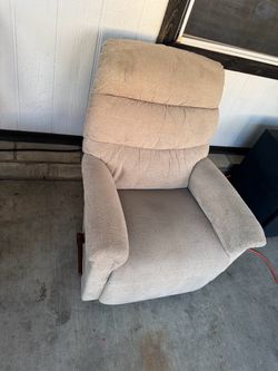 Beige recliner very comfortable