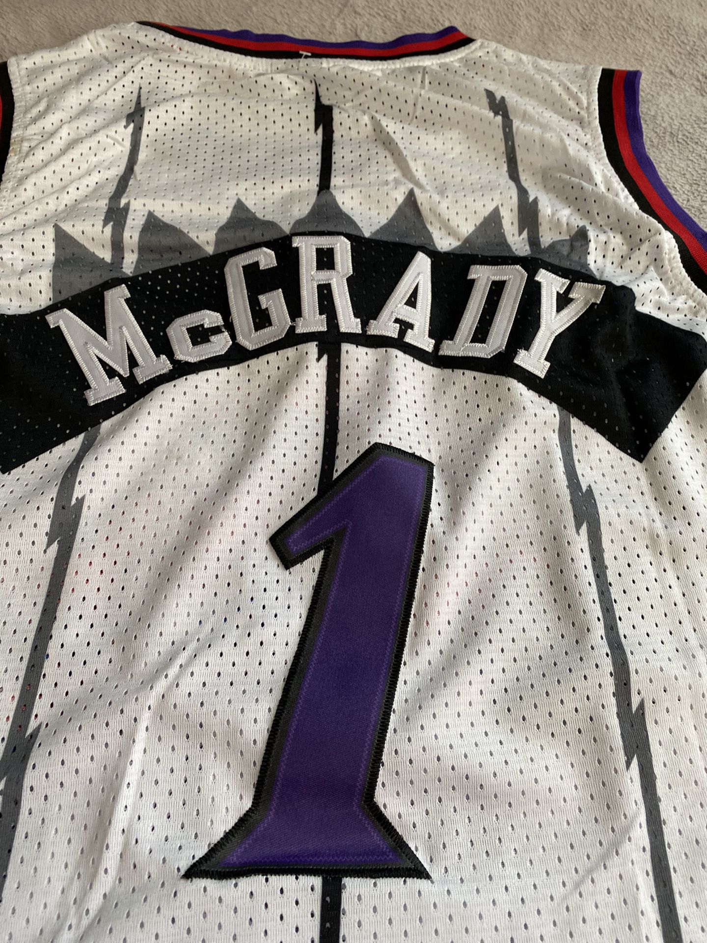 Tracy McGrady Toronto Raptors Mitchell & Ness Throwback Jersey - Purple XL  for Sale in Burbank, CA - OfferUp