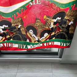 Reversible Mexican mariachi scene tablecloth (93” x 53”) – white, green & red with Aztec-inspired architecture design