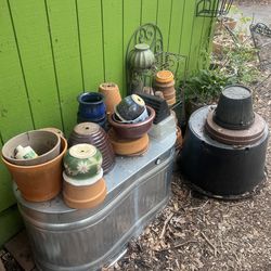 Terracotta planter saucers large and small iron shelf garden pots