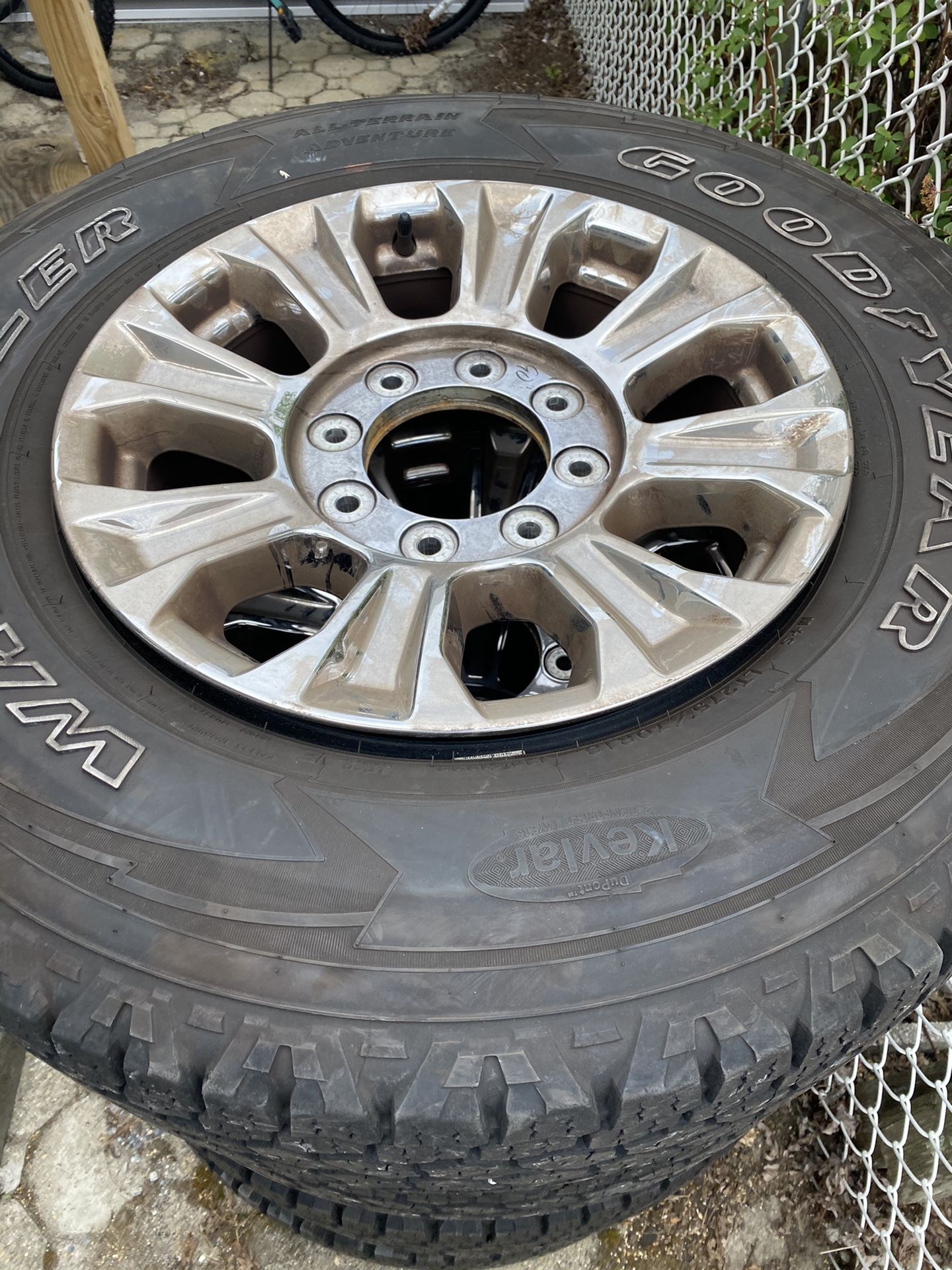 Ford F-250 rims and tires.