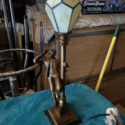 Bronze Lamp With Boy Looking Out.