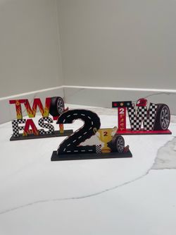 Two fast race car signs