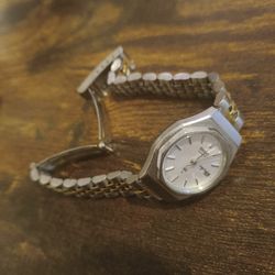 Small Seiko SQ Quartz Day-date.