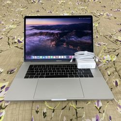 Apple Macbook Pro i7 16gb Ram 256gb SSD Amd Gpu Touch bar + NEW CHARGER/APPS