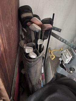 Set Of Old Golf Clubs