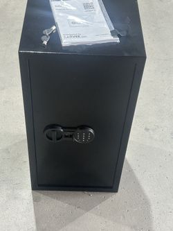 Brand new fireproof, safe with key and touchpad for $90