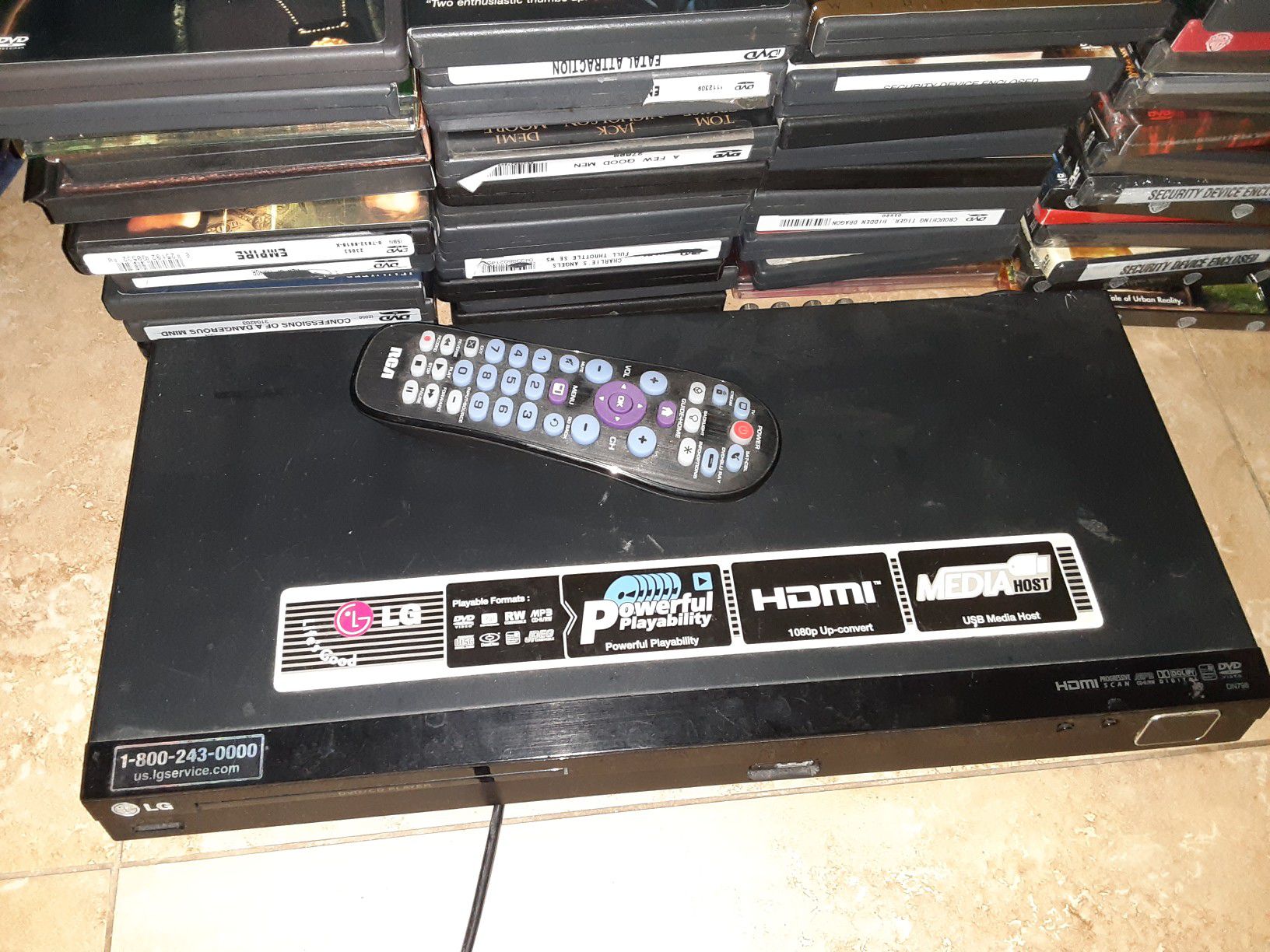 LG DVD player with 50 DVD MOVIES