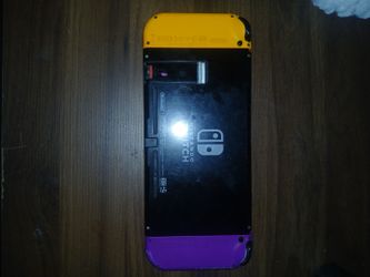 Nintendo Switch,  purple and yellow sticks