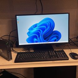 Small computer comes with 22 inch keyboard and mouse