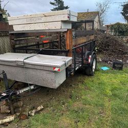 utility trailer 5x8ft with a braking system and modified to withstand heavy weight