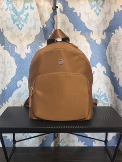 Iris and rainbow tiny backpack caramel 9 1/2 L x 7 1/2 H