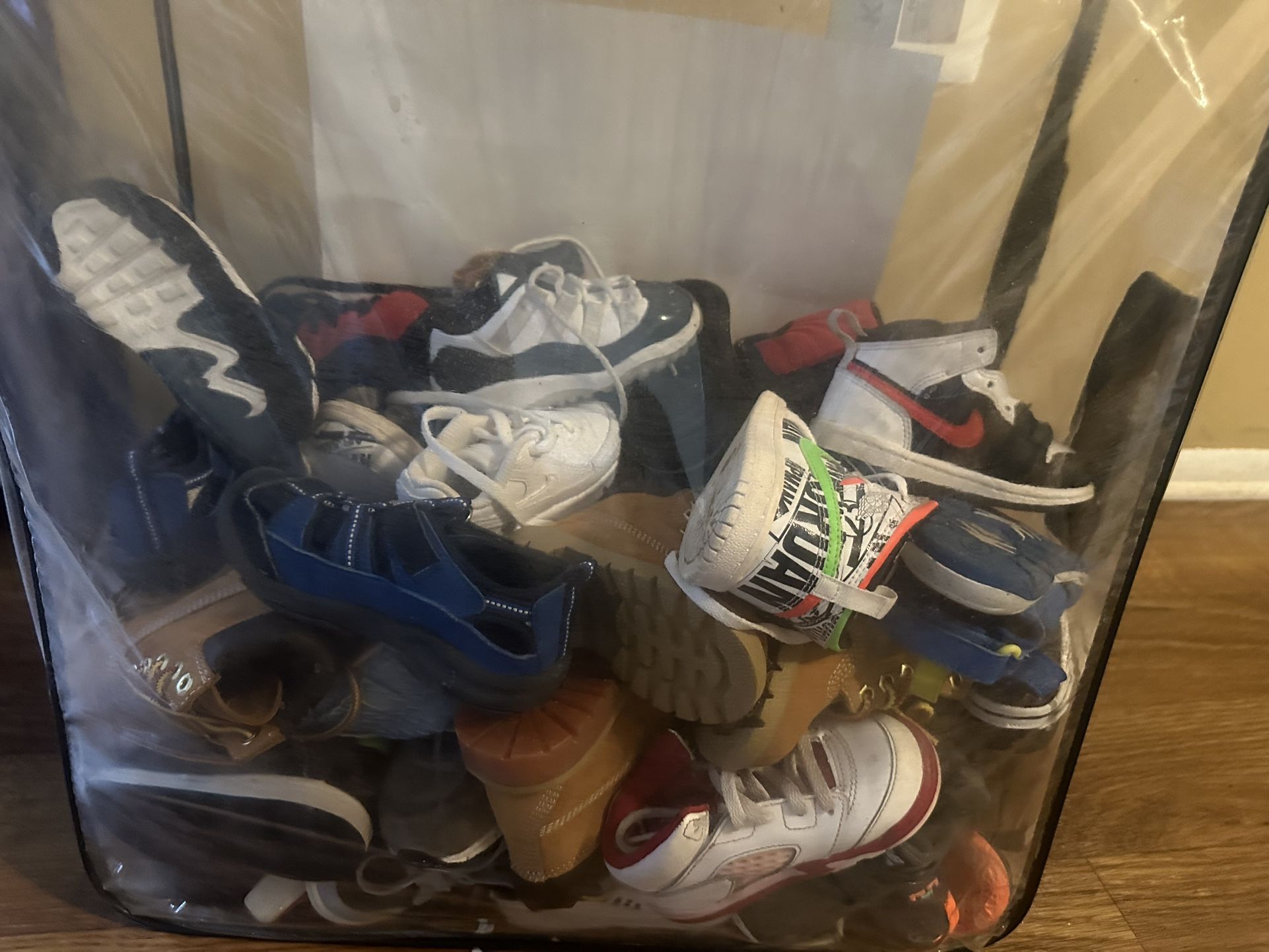 Bag is infant - toddlers sneakers / timberland- $120 Over $800 worth of shoes . Some never worn