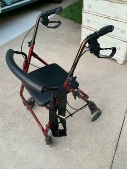 OC - rolling walker with seat and brakes