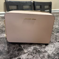 Michael Kors pink jetsetter purse 