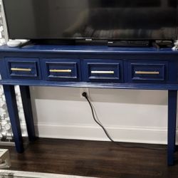 Navy blue console table with gold handles