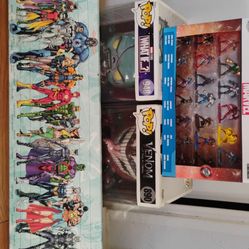 Funko Pops, 20 Metal Marvel Collectibles And A Marvel Poster 