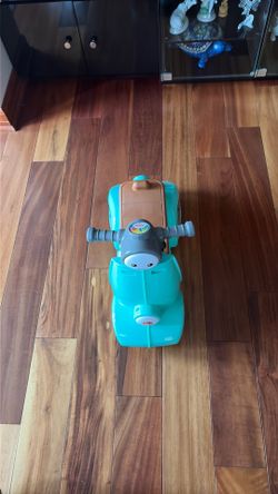 Toddler laugh and learn ride on.