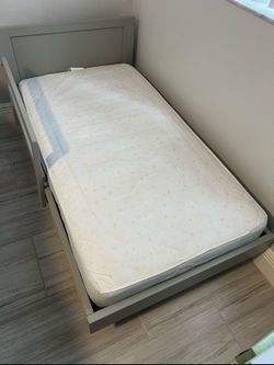 Pottery Barn Bed with Mattress Cover and  Mickey Sheet for kids