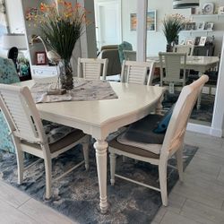 Wooden Table With Four Chairs