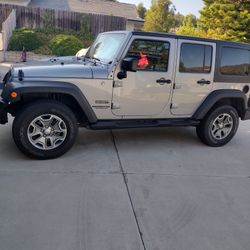 Jeep Wrangler Sport 4 Door. Silver.