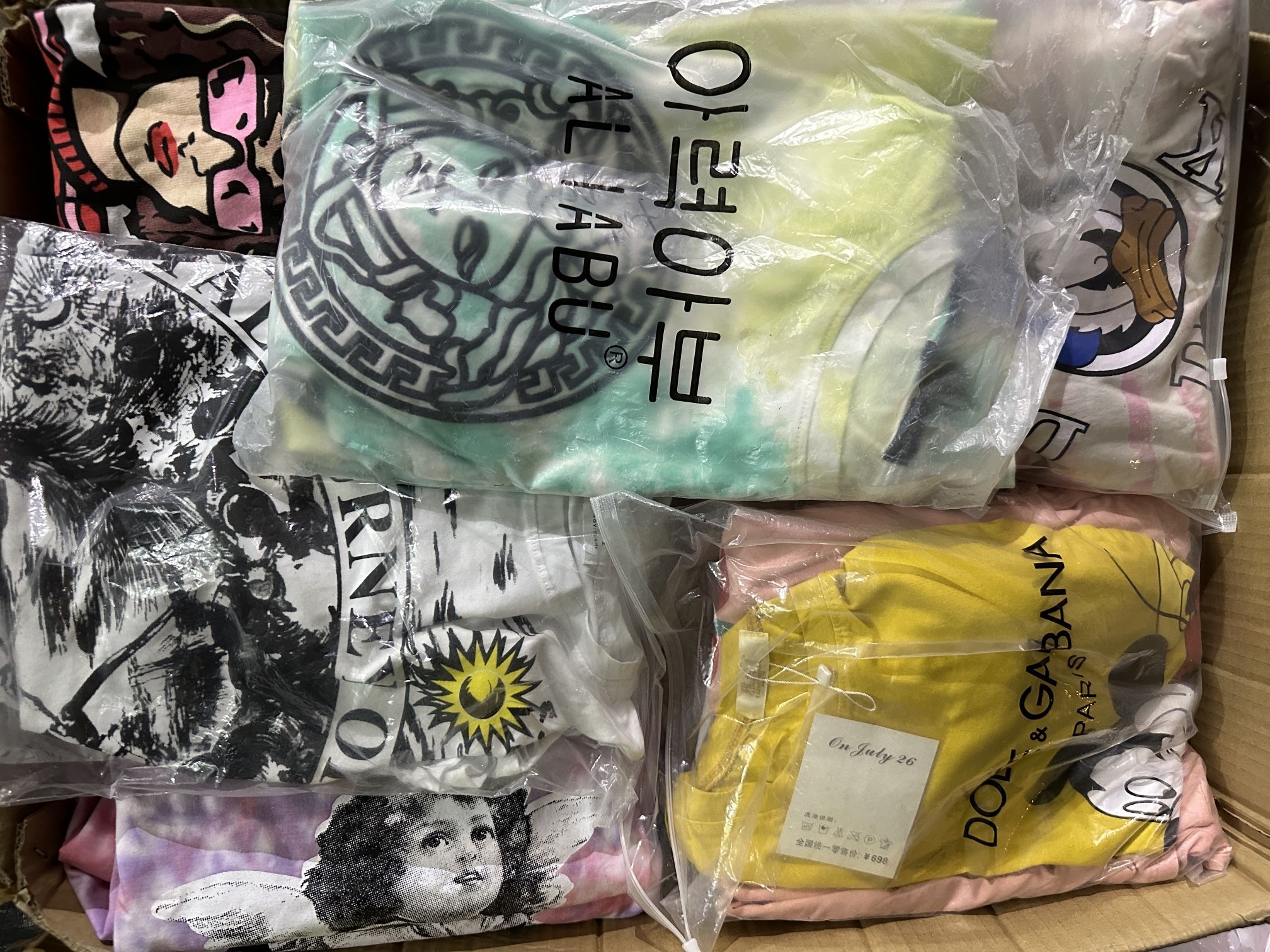 over 50 random t shirts on sale for only $150