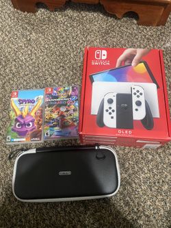 Nintindo Switch Oled With Games And Case And Sd Card