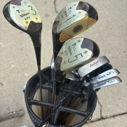 Women’s golf clubs and I’ll throw in the ball retriever