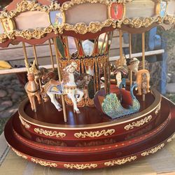 Oversized animated carousel with rotating figures