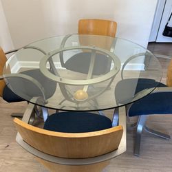 Glass Top Dining table and four chairs