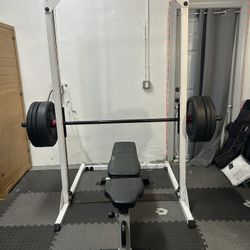 SMITH MACHINE - 140 Lb Bumper Plates/Bench