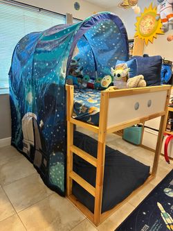 IKEA twin bunk bed with canopy