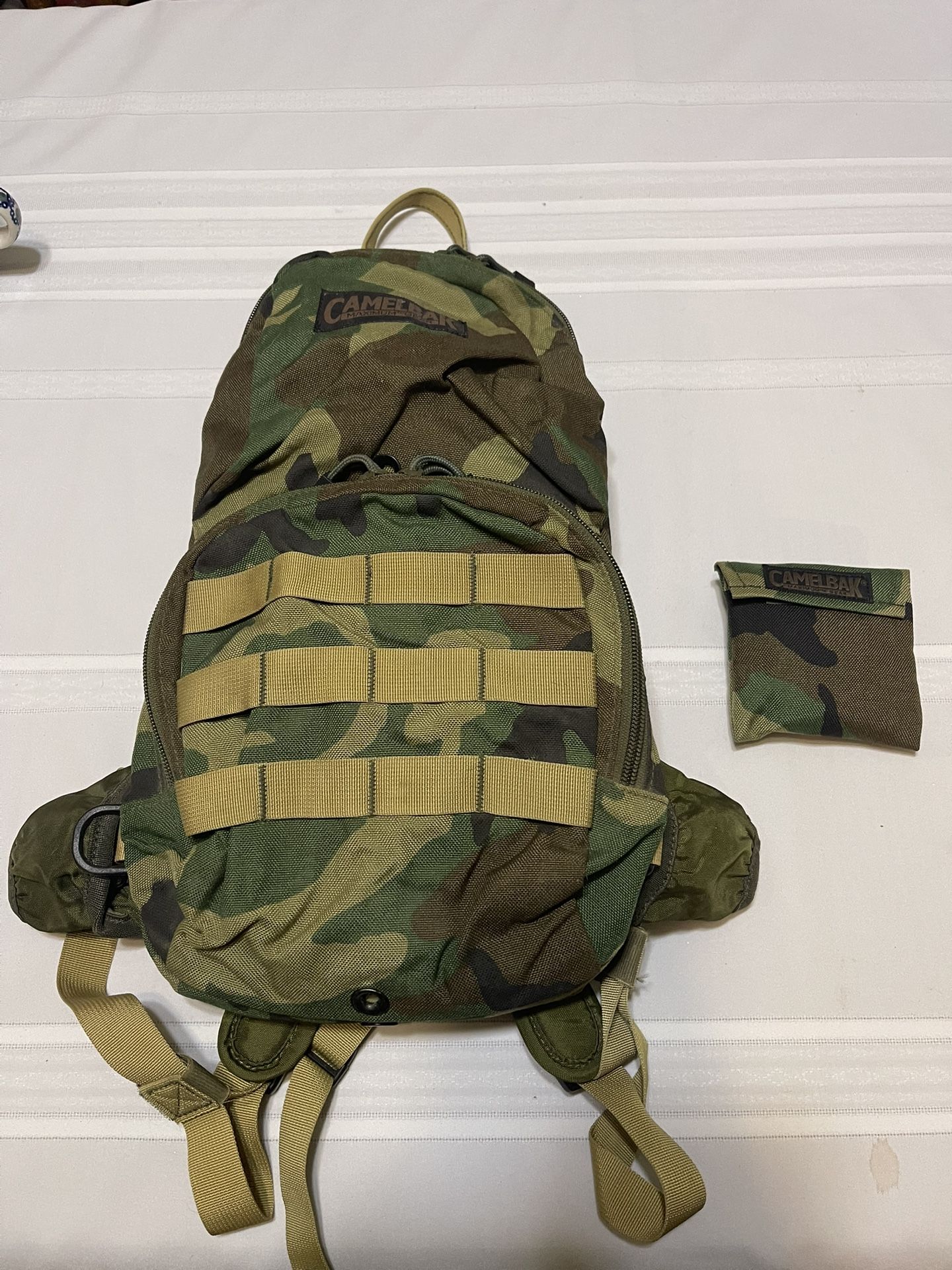 CamelBak maximum gear hydration bladder and pack with cleaning kit.