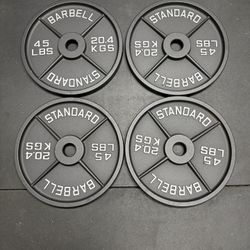 4 - 45 Pound Olympic Weight Plates 