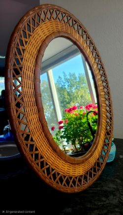 Vintage mid-century modern Italian wicker and rattan oval wall mirror 24"×36"