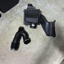 Complete factory intake removed from a 2019 Ford F-150 Raptor 3.5L EcoBoost.