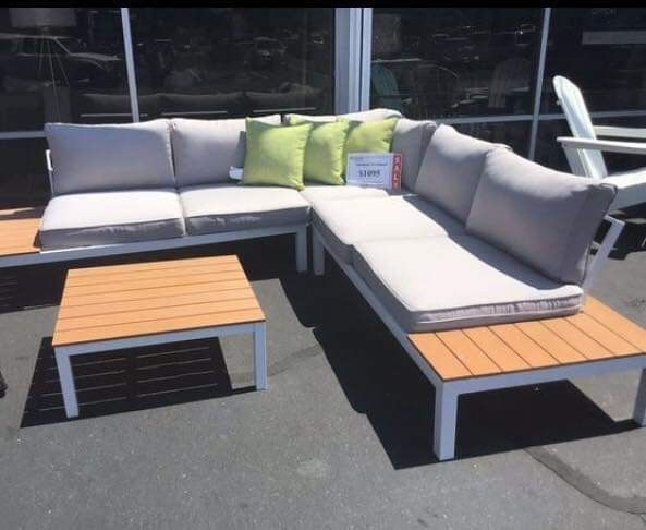 Outdoor sectional w/ table presented by modern home furniture in Everett