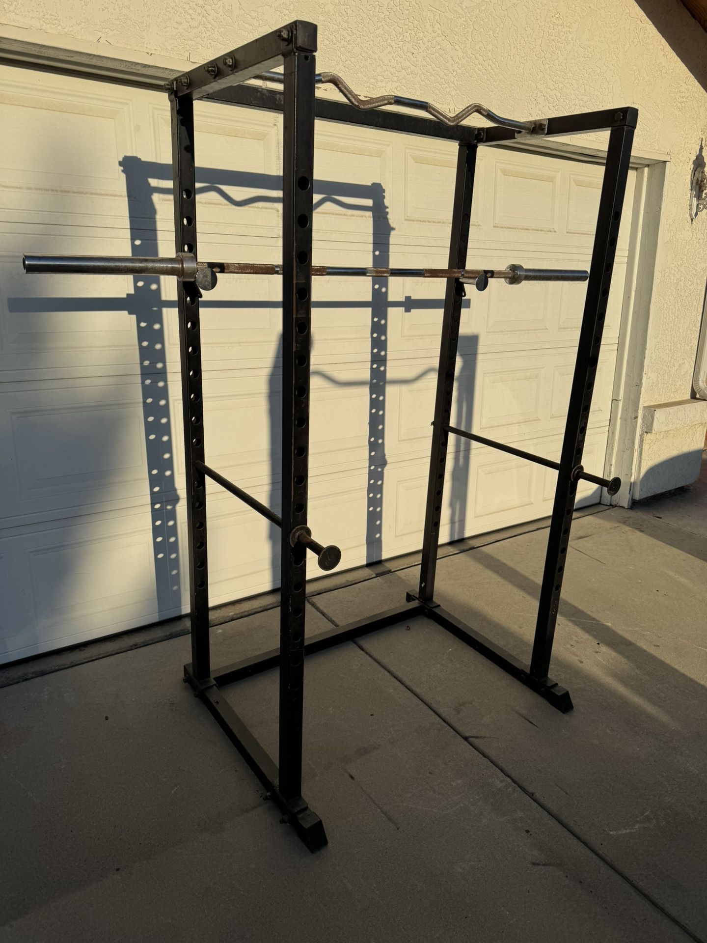 Squat Rack And Olympic Barbell
