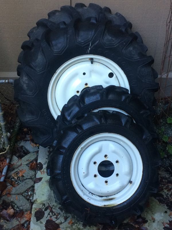 Ford New Holland compact tractor Ag tires and wheels. Fit 1215 & 1220