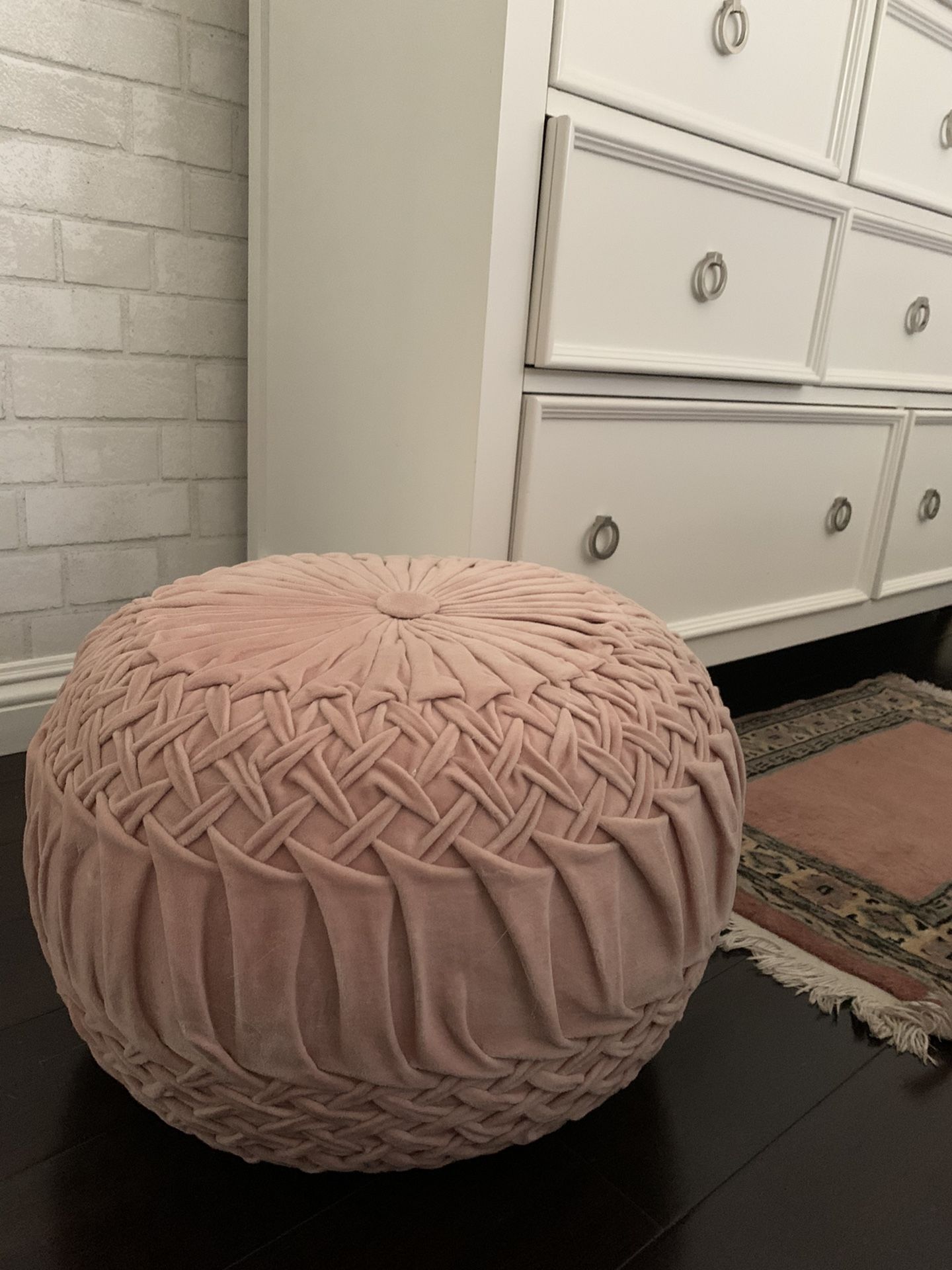 Blush tufted ottoman pouf