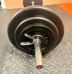 48 inches Steel Standard Barbell W/Weight Plates: 25s, 10s and 5s ponders. 93 # Brute W.