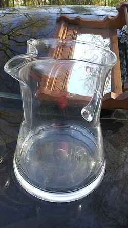 Large glass water vase.
