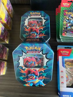 The hobbit , one piece , Pokémon , Ascended Heroes tins , Darkrai , Slaking