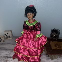 4 Crowne Porcelain Dolls