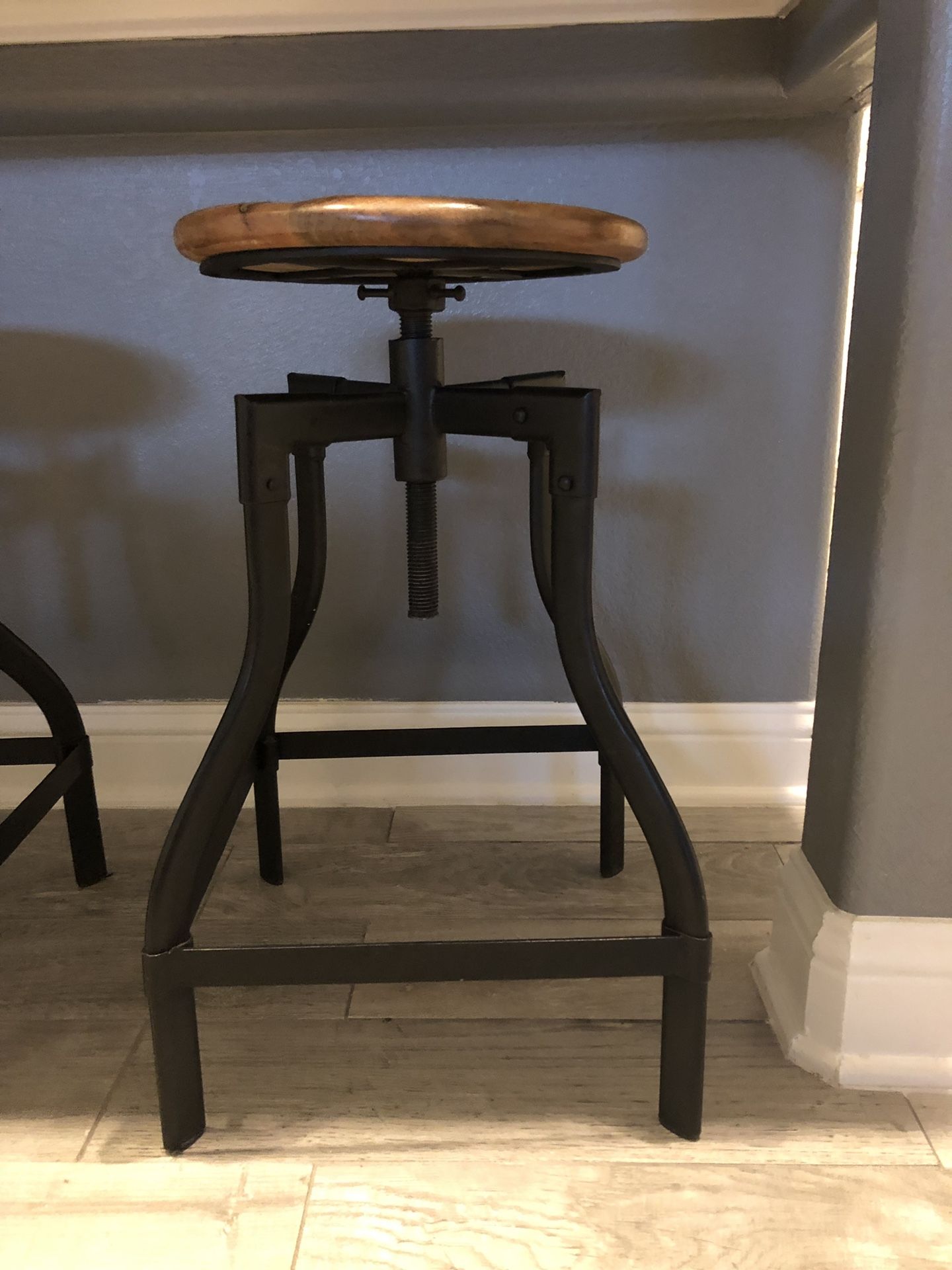 Metal and wooden counter stools