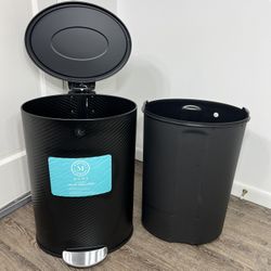 Martha Stewart Home kitchen trashcan pedal bin 10.5-gallon (40-liter) in a black finish, with a textured/ribbed body design