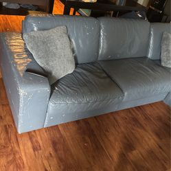 A Gray Leather Couch 