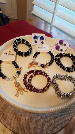 Custom jewelry. Will fit any wrist. Elastic band on bracelets. Earings are for Pierced ears