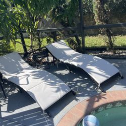 2 Wicker Pool Loungers And Table 