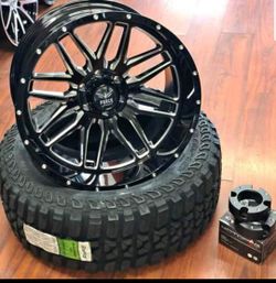 Rims tires and leveling kit installed